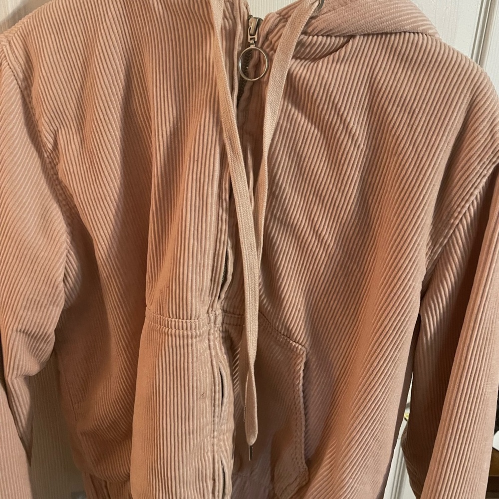 Pinkish/neutral jacket. Comfortable and warm. Size small. Worn one or twice